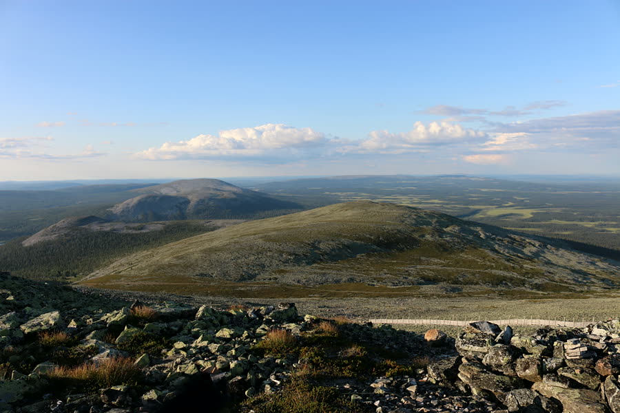 Open fells under a wide sky in Lapland